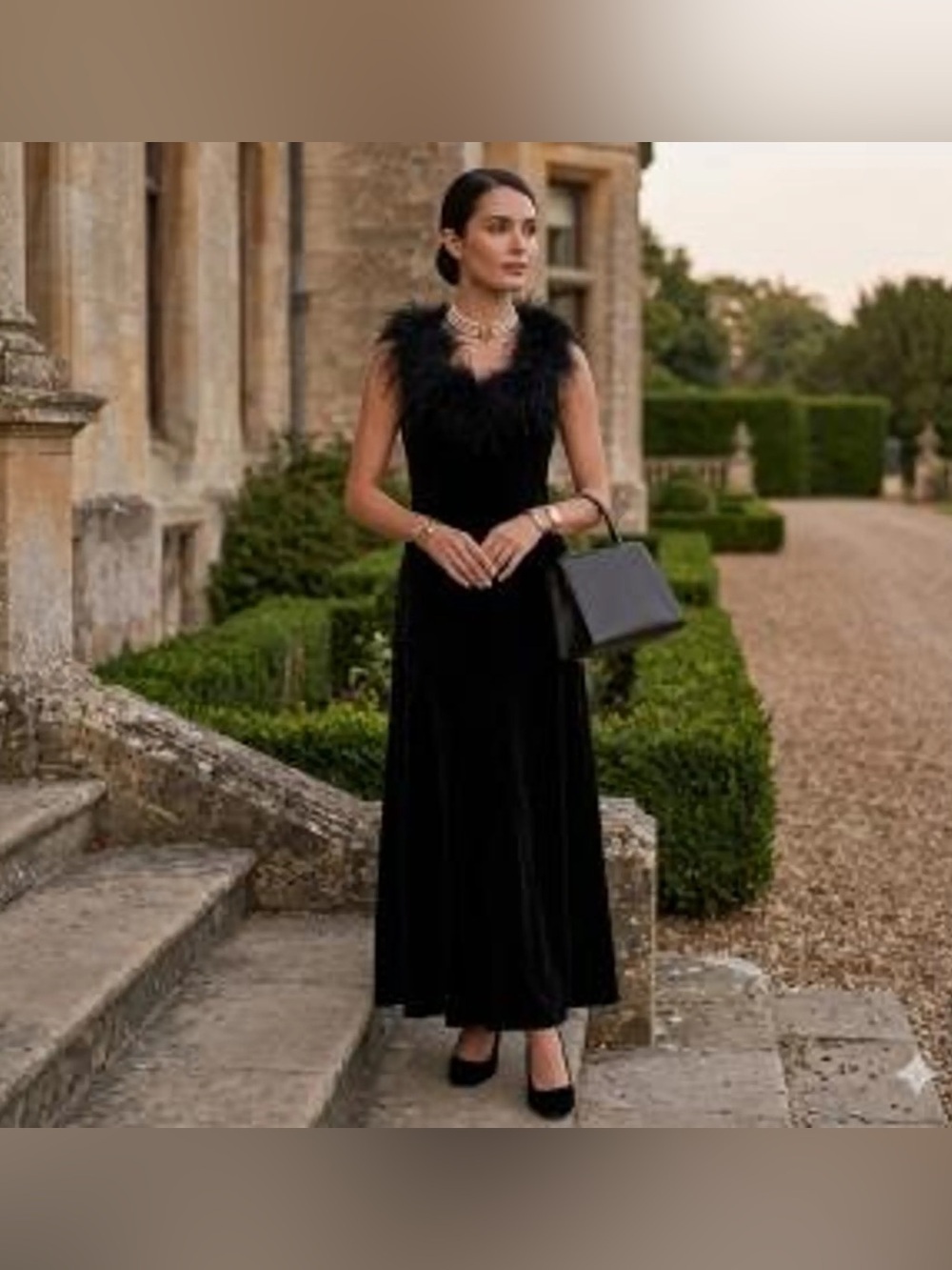 Jeffrey and Dara evenings by Tom Barra velvet maxi dress & faux fur feather trim
